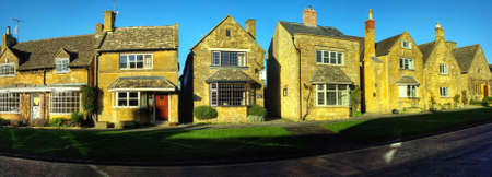 Old houses on the high street of Broadway village in the worcestershire cotswolds Midlands england UKの素材