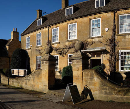 Old houses on the high street of Broadway village in the worcestershire cotswolds Midlands england UKの素材