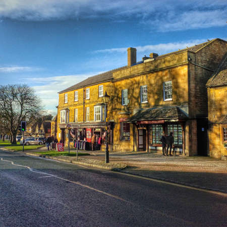 Old houses on the high street of Broadway village in the worcestershire cotswolds Midlands england UKの素材