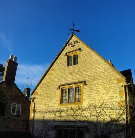 Old houses on the high street of Broadway village in the worcestershire cotswolds Midlands england UKの素材