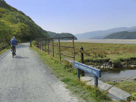 Mawddach cycle and hiking trail between barmouth and Dolgellau along the estuary gwynedd North Wales UKの素材