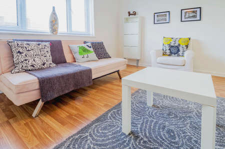 lounge area in newly restored rebuilt houseの写真素材