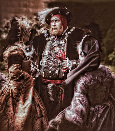 People in medieval Tudor costumes at English stately homeの素材