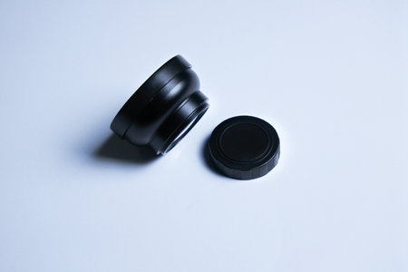Camera lens isolated on a white background. Close-up photo.の写真素材
