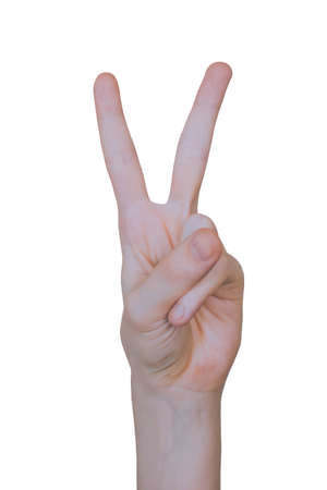 Victory sign, woman hand gesture on white backgroundsの写真素材