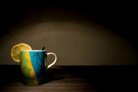 Color cup on a black backgroundの写真素材