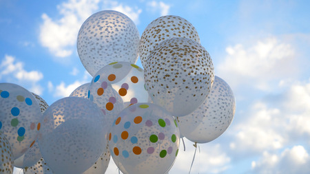 White balloons against the sky. White balls in the skyの写真素材