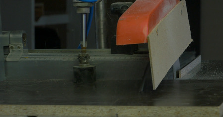Carpenter tools on wooden table with sawdust. Carpenter workplace. Work circular saw blade.の写真素材