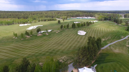 Top view green golf course outdoor green grass field. Aerial view from flying drone.の写真素材