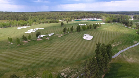 Top view green golf course outdoor green grass field. Aerial view from flying drone.の写真素材