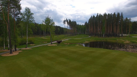Aeriel view on Golf cart on golf course in the afternoon with copy space. Elite golf club.の写真素材