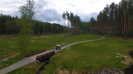 Aeriel view on Golf cart on golf course in the afternoon with copy space. Elite golf club.の写真素材
