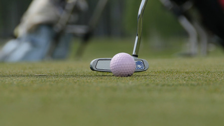 Golfer Hitting Golf Shot with Club on the Course. Hit the ball Golf.の写真素材