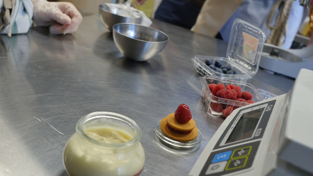 Table for making cake with raspberry cream weights.の写真素材