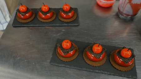 Red cakes with biscuits and chocolate. Tasty red cakesの写真素材