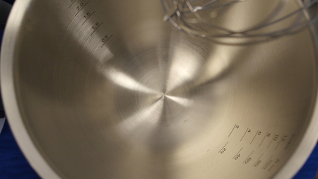 Metal dessert bowl top view. Aluminium cooking, dishware for professional kitchen.の写真素材