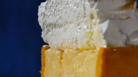 Whipped cream. White cream on the cake closeup.の写真素材