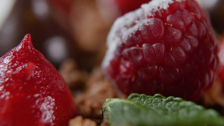 Close up of strawberry and chocolate spread. Chocolate drop and strawberries closeup.の写真素材