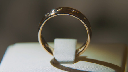 Golden finger ring with yellow precious stone. Ring in gold with sapphires browm, wedding ring -...