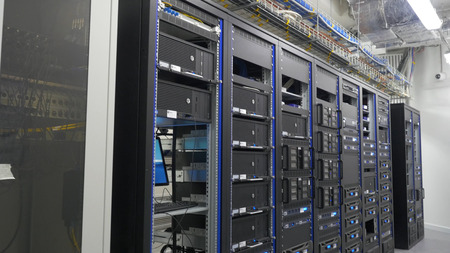 Many powerful servers running in the data center server room.