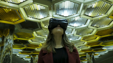 Virtual reality, 3D-technologies, cyberspace, science and people concept - happy young woman in 3d...