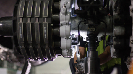 Calm workers controlling aircraft machine.の写真素材