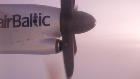 United Arab Emirates, Dubai - October 2017: Old plane in the air above the clouds. Propeller of old airplane close up. Airplane with propellersのeditorial素材