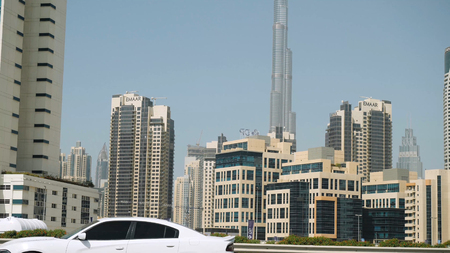 United Arab Emirates, Dubai - October 2017: Beautiful modern architecture Dubai, travel concept. View of the city from the car. View from the interior of the car on the streets of Dubaiのeditorial素材