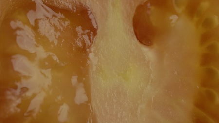 Slicing tomato. Macro. Tomato on the table close-up pの写真素材