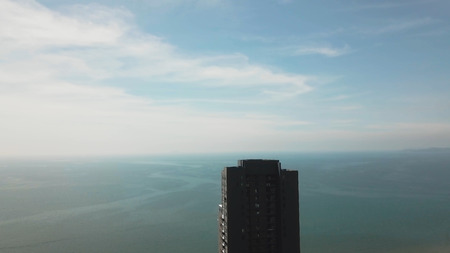 Pattaya - a resort town with beautiful houses and hotels, luxury hotels. Video. Skyscraper on the shore of the Gulf in Pattayaの写真素材