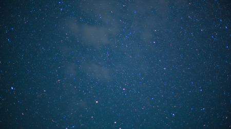 Beautiful night sky and stars with meteor or shooting star as background. Video. Animation of a...
