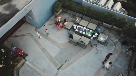 Family picnic on the roof. Video. A big family had a picnic on the roof of a skyscraper. The...