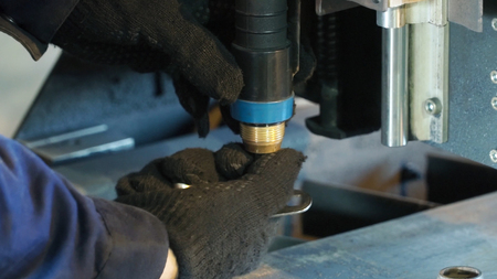 Man repairing gas cutting. Clip. Man fixes the barrel machines for metal cutting gas. Repair...