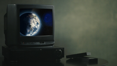Old vintage TV in the Vintage room. Planet earth on TV.の写真素材