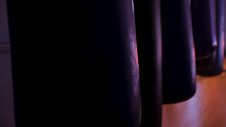 Boxing sand bags hanging at a sports gym. punching bags in boxing room, sport. Punching bag at gym.の写真素材