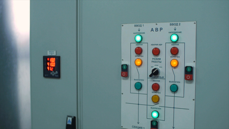 Industrial Switching Button and Light On Control Panel. Clip. Instrument panel at the factory.