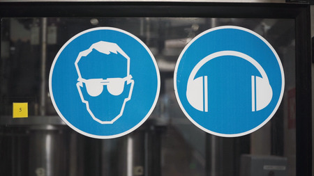 Common safety notice on wearing personal protective equipment at factory. Clip. Safety instructions at the factory.の写真素材
