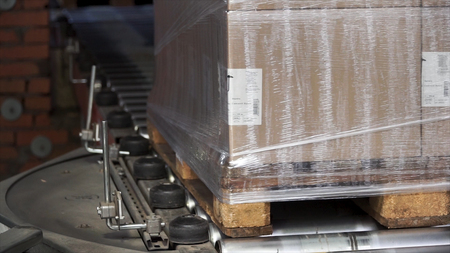 Conveyer roller sorting system in distribution warehouse. Clip. Modern roller conveyor. Equipment...