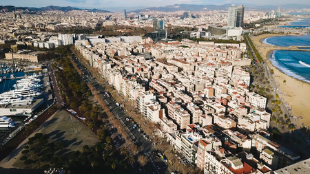 Top view of the modern city by the sea. Stock. Beautiful city on the beach on a Sunny day.の写真素材