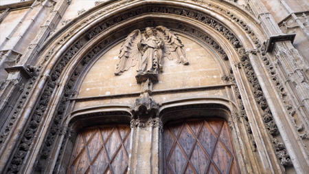 Sculptures and antique artistic reliefs on the gates.の写真素材