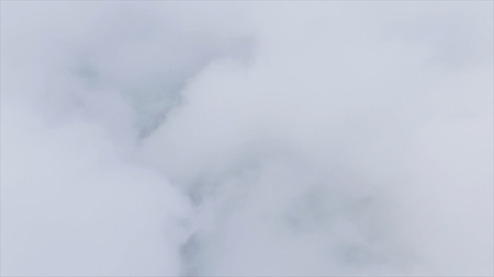 View of the sky above the clouds. Shot. Top view of clouds. Flying above the clouds. View from the...
