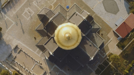 Top view on great christian church with golden dome. Shot. The dome of the Church in the center of the screen.の写真素材