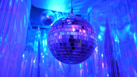 Disco Background with Shiny Retro Disco Ball. Great Background for Disco Party or Small Karaoke Event. Blue Theme. Blue disco ball.の写真素材