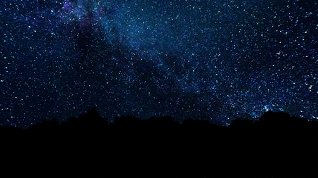 Milky Way, trail star galaxy and stars moving across night sky. Abstract night sky background with stars and milky wayの写真素材