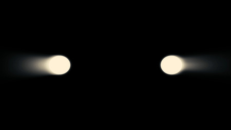 Animation of car headlight on black background. Luminous headlights of automobile contrast with...