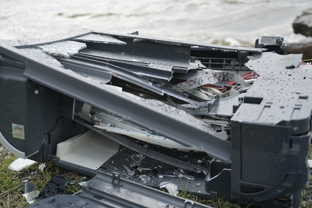 Man breaks a hammer system unit computer. Man with a sledge hammer and destroys computer in slow...