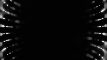 Abstract background with animation of moving shining particles in rows on black background, monochrome. Shimmering white dots flying in curved lines, seamless loop.の写真素材