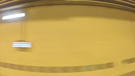 A car driving inside a tunnel, view from the window, fisheye effect. Scene. View from the vehicle...