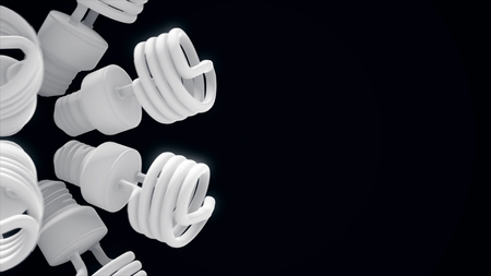 Close up for white energy saving lamps rotating isolated on black background. Animation. Monochrome...