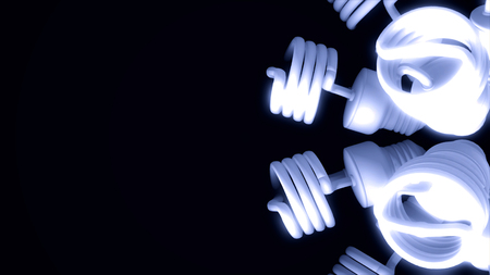 Close up for blue energy saving lamps rotating isolated on black background. Animation. Abstract motion of shining halogen bulbs, seamless loop.の写真素材